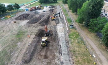 Construction work in a field with machinery