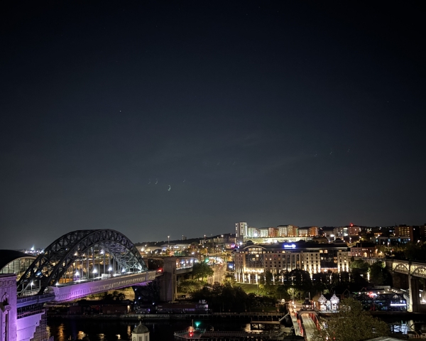 Aerial photo of Newcastle with Gateshead Bridge in the evening